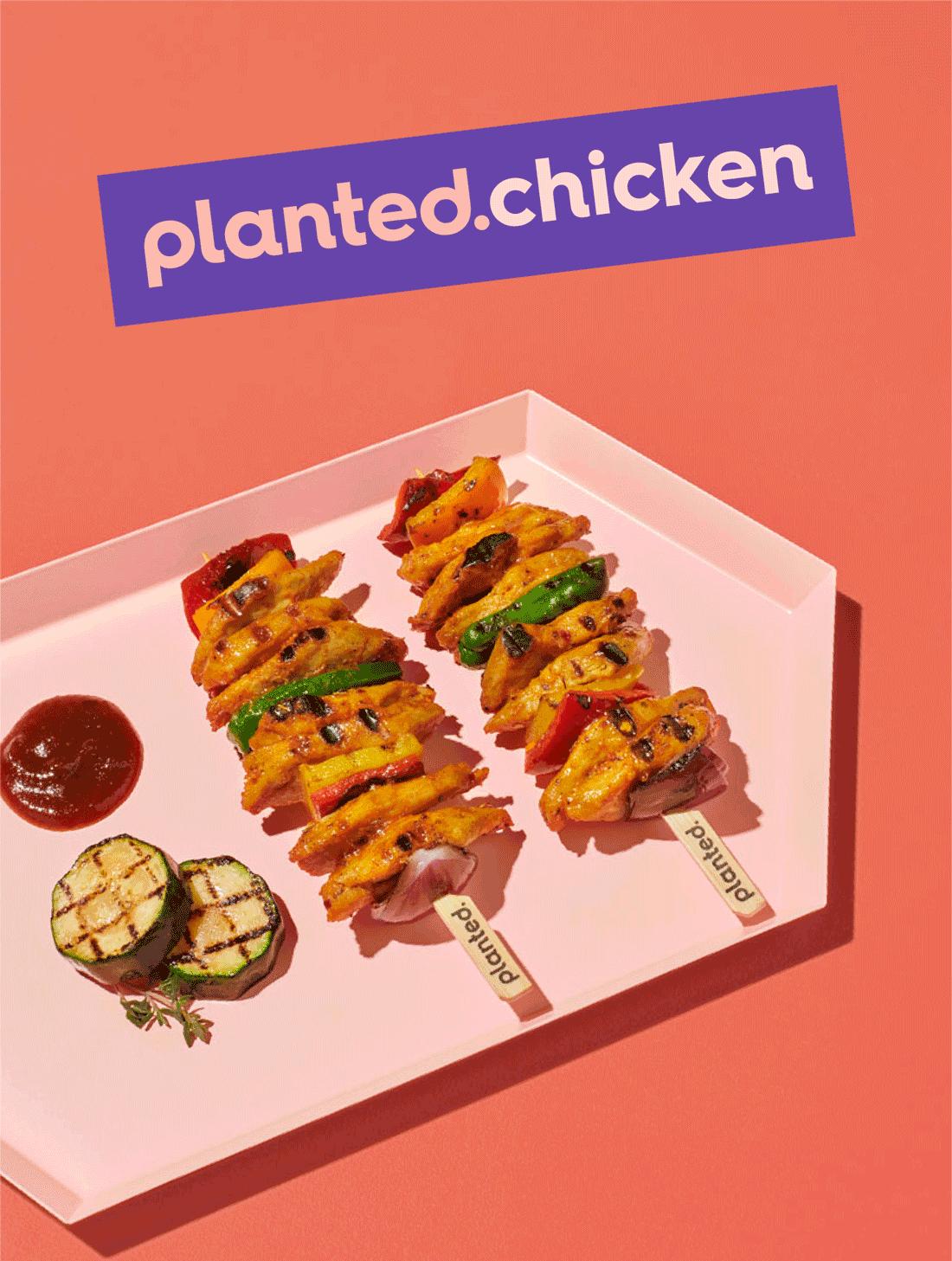 Animated poster alternating between planted.chicken skewers on coral and a planted.pulled burger on yellow